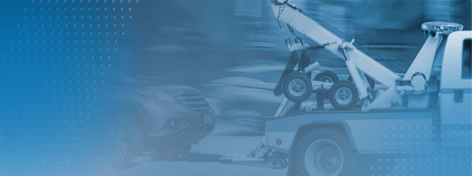 An image of a car being pulled by a tow truck with a blue and white patterned background.