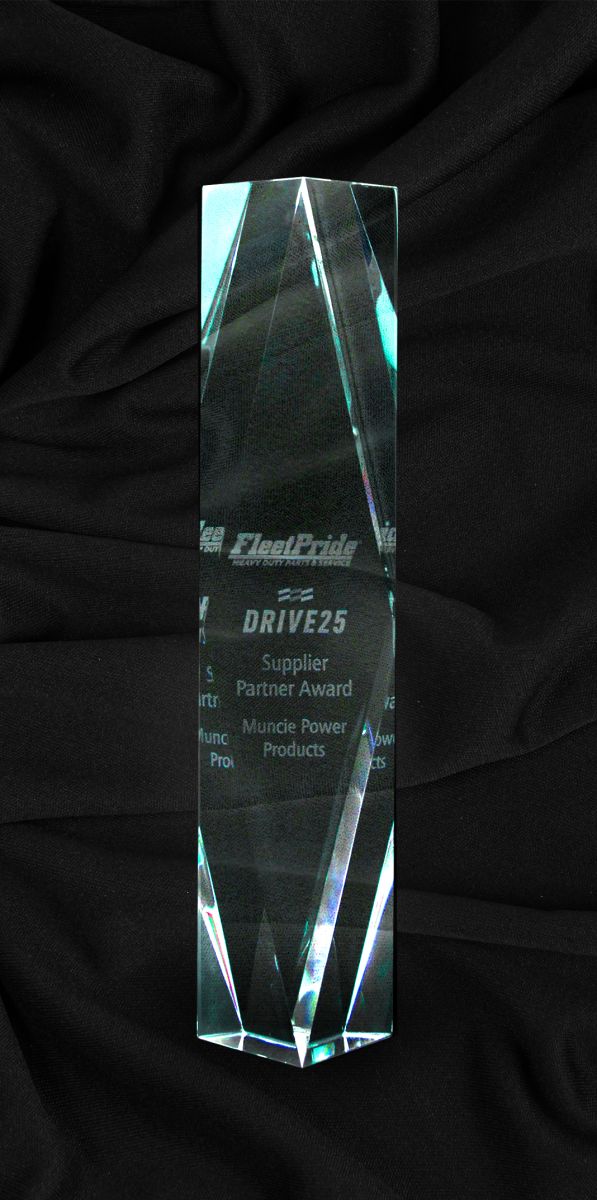 An image of the glass Supplier Partner Award from FleetPride from DRIVE25 on a black background.