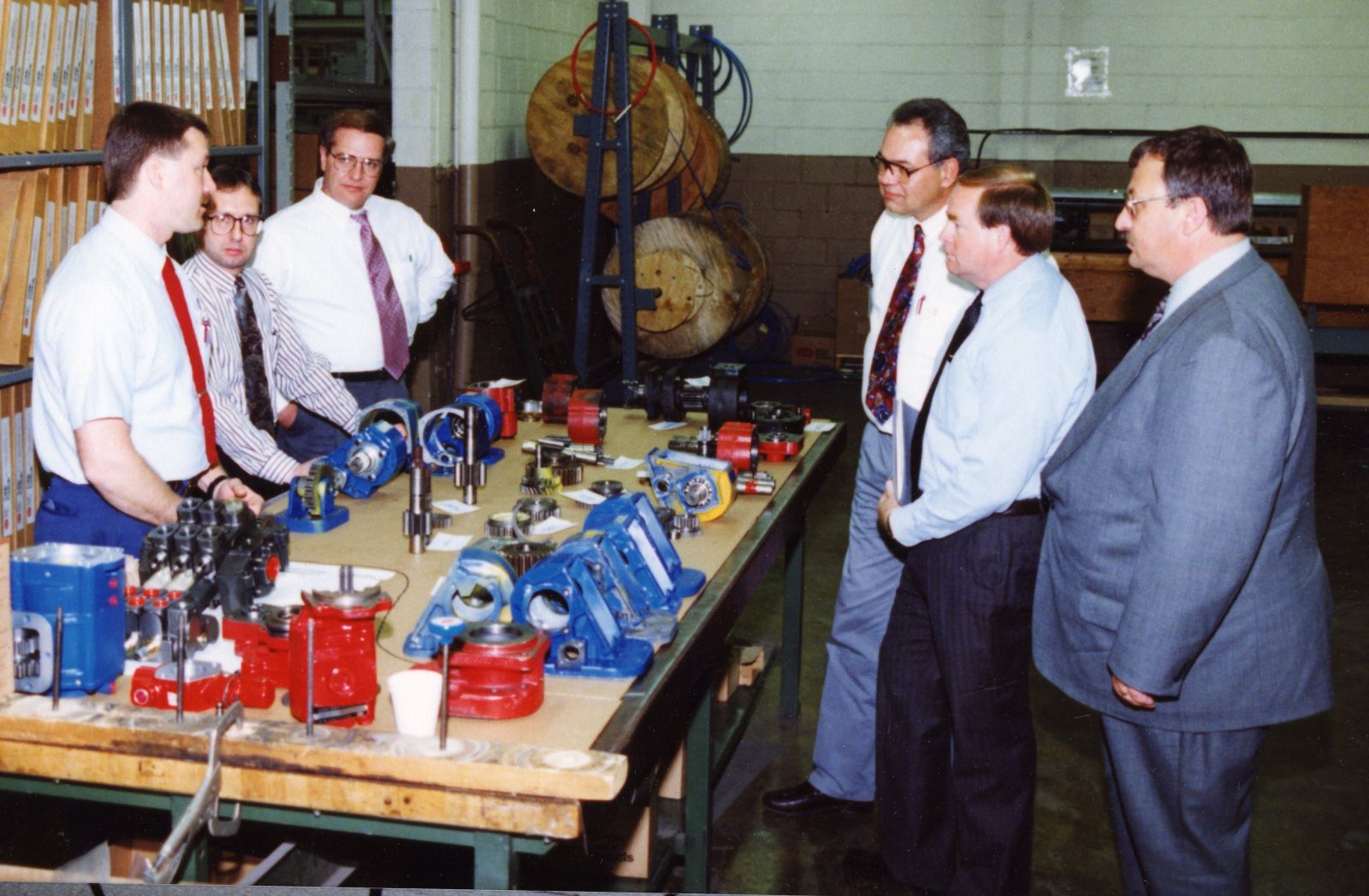 An archival photo of members of the sales team learning about our products in 1994.