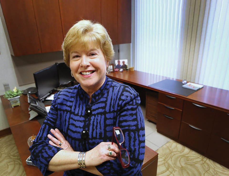 Executive Administrative Assistant Liz Ludwick stands in her office at Muncie Power Products