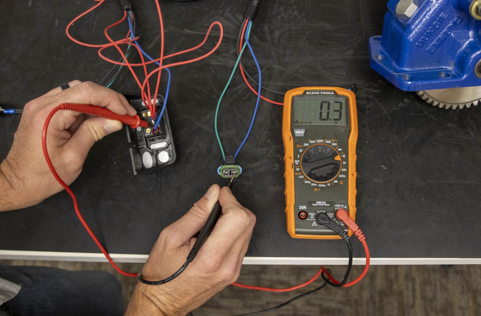 An image showing the testing of continuity between the rocker switch and pressure switch connector.