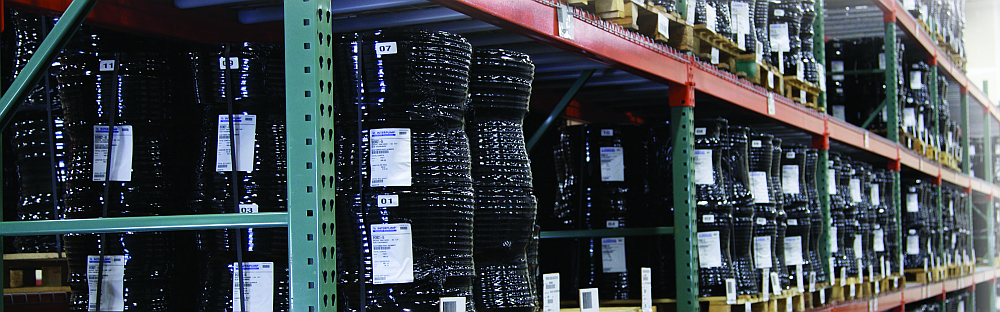 An image of hydraulic hose stocked in a warehouse.